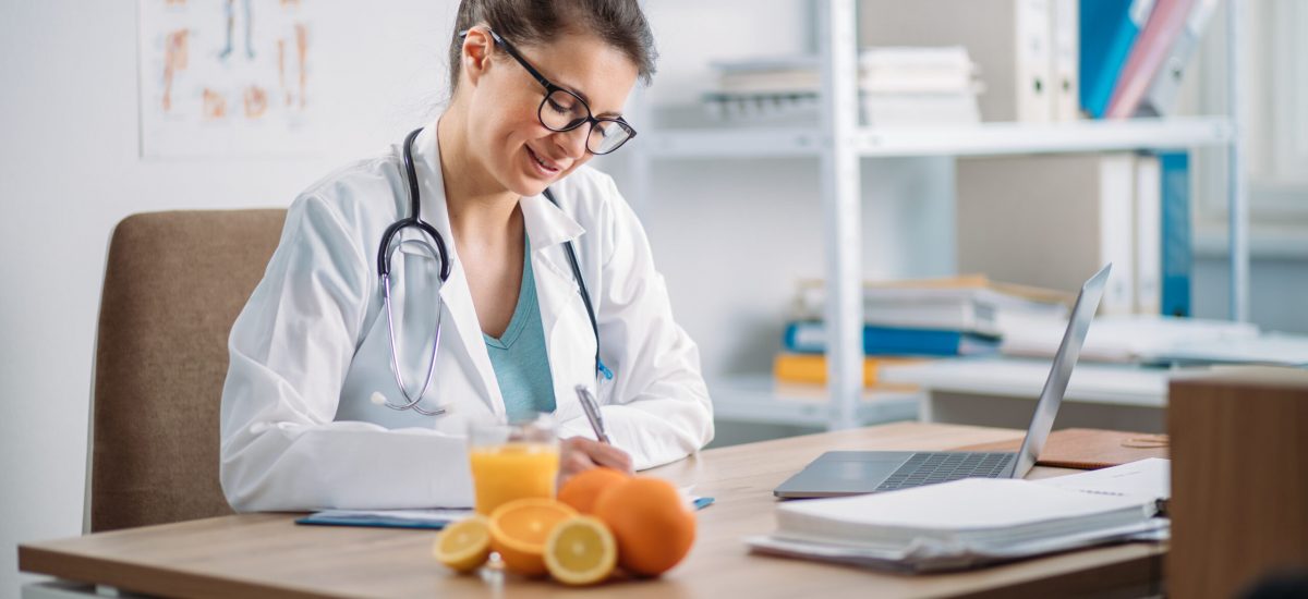 Female,Doctor,Writing,Prescription,In,The,Clinic